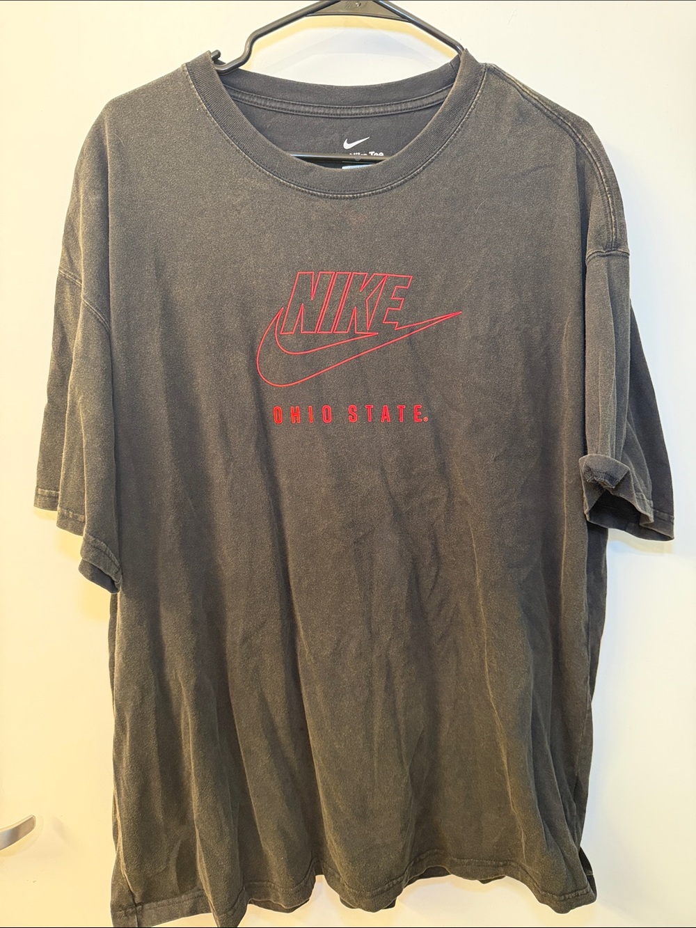 Nike Black Short-Sleeve Graphic Logo Tee with Red Accents